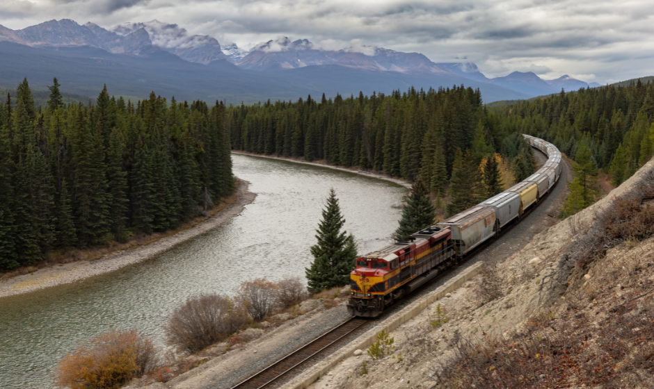 A freight train in the Canadian wilderness