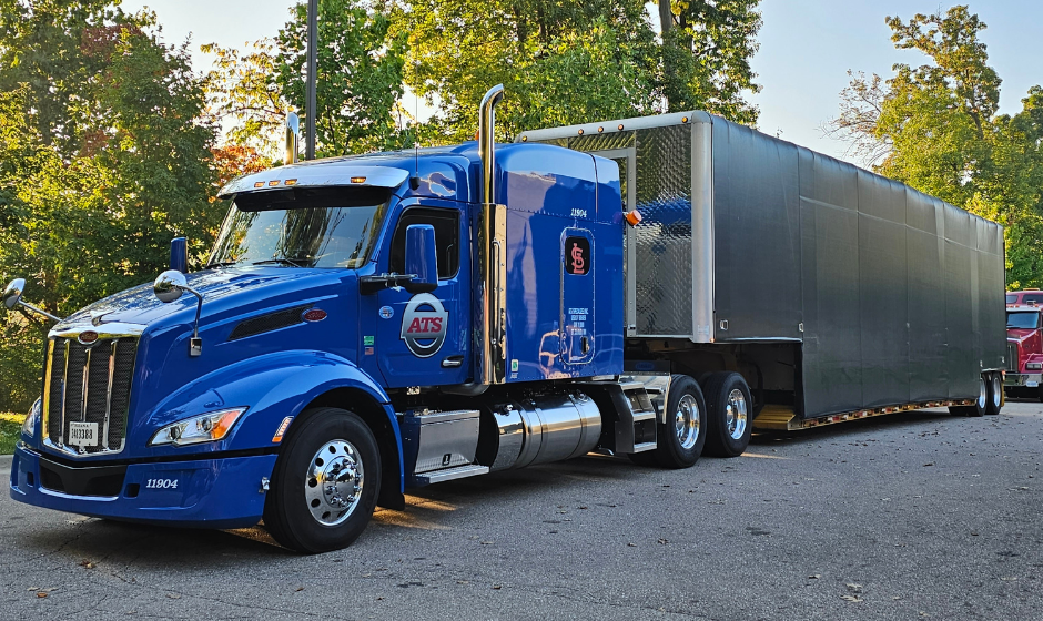 An ATS semi with a curtainside trailer