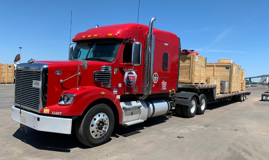 Crated freight on a step deck flatbed